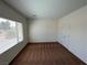 Spacious bedroom featuring carpet, a window with a view, and ample closet space at 3029 Frigate Way, North Las Vegas, NV 89084