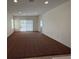 Expansive living room featuring neutral walls, carpet, and bright natural light at 3029 Frigate Way, North Las Vegas, NV 89084