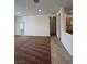 The spacious living room features tile and carpet, creating a cozy and inviting atmosphere at 3029 Frigate Way, North Las Vegas, NV 89084