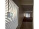 Well-lit and spacious living room with neutral paint and carpet, complemented by natural light at 3029 Frigate Way, North Las Vegas, NV 89084