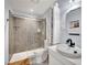 Modern bathroom features walk-in shower, updated fixtures, and tiled floor at 3080 Yankee Clipper Dr, Las Vegas, NV 89117