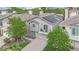 Inviting two-story home featuring a balcony, solar panels and well-manicured landscaping at 3080 Yankee Clipper Dr, Las Vegas, NV 89117