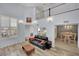 Open-concept living room with hardwood floors and light-filled windows at 3080 Yankee Clipper Dr, Las Vegas, NV 89117