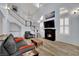 Bright living room features a fireplace, high ceilings, lots of light and modern furnishings at 3080 Yankee Clipper Dr, Las Vegas, NV 89117