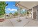 Spacious, covered patio with concrete flooring and views of greenery at 3080 Yankee Clipper Dr, Las Vegas, NV 89117