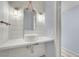 Nautical-themed powder room featuring a modern vessel sink and rope accents at 3080 Yankee Clipper Dr, Las Vegas, NV 89117