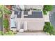 Home rooftop equipped with solar panels and backyard patio at 3080 Yankee Clipper Dr, Las Vegas, NV 89117