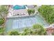 Aerial view of a community tennis court, surrounded by lush landscaping and well maintained grounds at 3080 Yankee Clipper Dr, Las Vegas, NV 89117
