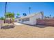 Backyard showing the home's exterior, patio and rock landscaping at 3118 Floral Vista Ave, Henderson, NV 89014