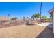 The backyard is enclosed with brick walls and includes desert landscaping at 3118 Floral Vista Ave, Henderson, NV 89014