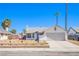 Charming single-story home featuring a two-car garage and low-maintenance desert landscaping at 3118 Floral Vista Ave, Henderson, NV 89014