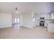 Open floor plan showcasing new wood floors, white paint, and updated lighting at 3118 Floral Vista Ave, Henderson, NV 89014