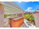 Outdoor patio with spa, perfect for relaxing and enjoying the backyard's tranquil environment at 3413 Freestone Ln, North Las Vegas, NV 89032