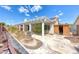Spacious backyard area with partial cover offering a blend of sun and shade, perfect for outdoor activities at 3413 Freestone Ln, North Las Vegas, NV 89032