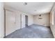 This carpeted bedroom includes two closet doors and has a large window for ample natural lighting at 3413 Freestone Ln, North Las Vegas, NV 89032