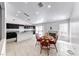 Bright eat-in kitchen featuring granite countertops, a fireplace, and stainless appliances at 3413 Freestone Ln, North Las Vegas, NV 89032