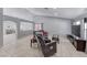 Spacious living room features tile floors, neutral paint, and plenty of room for seating and entertaining at 3413 Freestone Ln, North Las Vegas, NV 89032