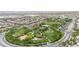 This aerial view showcases the neighborhood park and green spaces nearby at 3483 French Daisy St, Las Vegas, NV 89135
