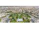 Wide aerial view of community park with green space, trees, and neighborhood homes at 3483 French Daisy St, Las Vegas, NV 89135