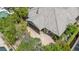 Aerial view showcasing covered patio, desert landscaping, and tile roof at 3483 French Daisy St, Las Vegas, NV 89135