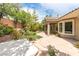 Backyard featuring a large patio and a garden with flowers at 3483 French Daisy St, Las Vegas, NV 89135