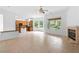 Open living room boasts ample natural light and views of the kitchen at 3483 French Daisy St, Las Vegas, NV 89135