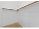 An empty walk-in closet with neutral carpet and a clothes rod at 3483 French Daisy St, Las Vegas, NV 89135