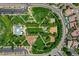 Stunning aerial view of the community park featuring well-manicured lawns, walkways, and lush landscaping at 3614 Coventry Gardens Dr, Las Vegas, NV 89135