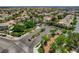 Aerial view of a lush neighborhood with mature trees, landscaping and well maintained streets at 3614 Coventry Gardens Dr, Las Vegas, NV 89135