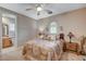 Inviting bedroom with plush bedding, nightstands, and an en-suite bathroom at 3614 Coventry Gardens Dr, Las Vegas, NV 89135