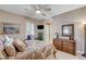 Comfortable bedroom featuring ample natural light and ceiling fan at 3614 Coventry Gardens Dr, Las Vegas, NV 89135