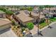 Aerial view of single-story home with solar panels, desert landscaping, and a neatly maintained front yard at 3614 Coventry Gardens Dr, Las Vegas, NV 89135