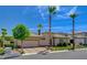 Well maintained home with a three-car garage, desert landscaping and sunny blue sky at 3614 Coventry Gardens Dr, Las Vegas, NV 89135