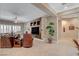 Cozy living room with built-in media center, neutral decor, and ample natural light at 3614 Coventry Gardens Dr, Las Vegas, NV 89135