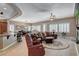 Open floor plan featuring the living room, dining area, and access to the kitchen at 3614 Coventry Gardens Dr, Las Vegas, NV 89135