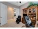 Bright office with custom wood cabinets and comfortable seating at 3614 Coventry Gardens Dr, Las Vegas, NV 89135