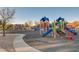 Community playground with multiple play structures, slides, and swings for outdoor fun at 3614 Coventry Gardens Dr, Las Vegas, NV 89135