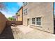 Low maintenance backyard featuring a paved patio with a fire pit and bench at 378 Gracious Way, Henderson, NV 89011