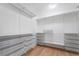 Walk-in closet featuring shelves and storage baskets at 378 Gracious Way, Henderson, NV 89011