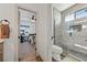 Updated bathroom with glass-enclosed shower and pebble-stone shower floor at 3880 Rudek St, Pahrump, NV 89061