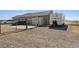 Spacious driveway with gated access to a modern home and recreational vehicle parking at 3880 Rudek St, Pahrump, NV 89061