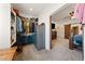 Large walk-in closet adjacent to the main bedroom, showing a gun safe, and access to the main bedroom at 3880 Rudek St, Pahrump, NV 89061