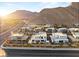 Wide aerial view of luxury community with stunning desert landscape and mountain views at 4024 Desert Trace Ct, Las Vegas, NV 89129
