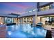 Stunning outdoor area with pool, hot tub, and multiple patios for entertaining at 4024 Desert Trace Ct, Las Vegas, NV 89129