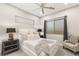 Calming bedroom with neutral tones, plush bedding, and elegant decor for a peaceful retreat at 4024 Desert Trace Ct, Las Vegas, NV 89129