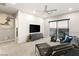 Comfortable living room with modern furniture, entertainment center, and scenic outdoor views at 4024 Desert Trace Ct, Las Vegas, NV 89129