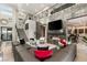 Stunning living room with a fireplace, high ceilings, a staircase, and an open design at 4024 Desert Trace Ct, Las Vegas, NV 89129