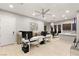 Bright and spacious office with multiple workstations, modern lighting, and ample storage at 4024 Desert Trace Ct, Las Vegas, NV 89129