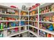 Spacious walk-in pantry with custom shelving, providing ample storage for kitchen essentials and supplies at 4024 Desert Trace Ct, Las Vegas, NV 89129