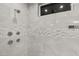 Modern shower with marble tiling, shower jets, and sleek fixtures for a spa-like experience at 4024 Desert Trace Ct, Las Vegas, NV 89129